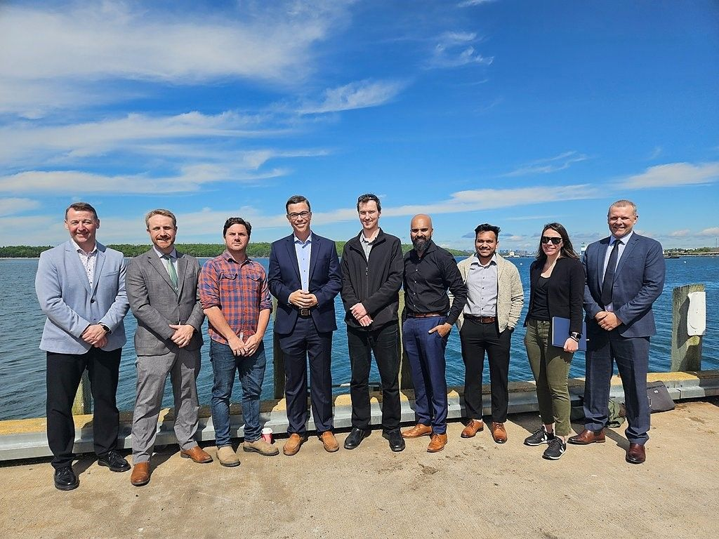 Group gathered beside the waterfront in Eastern Passage.