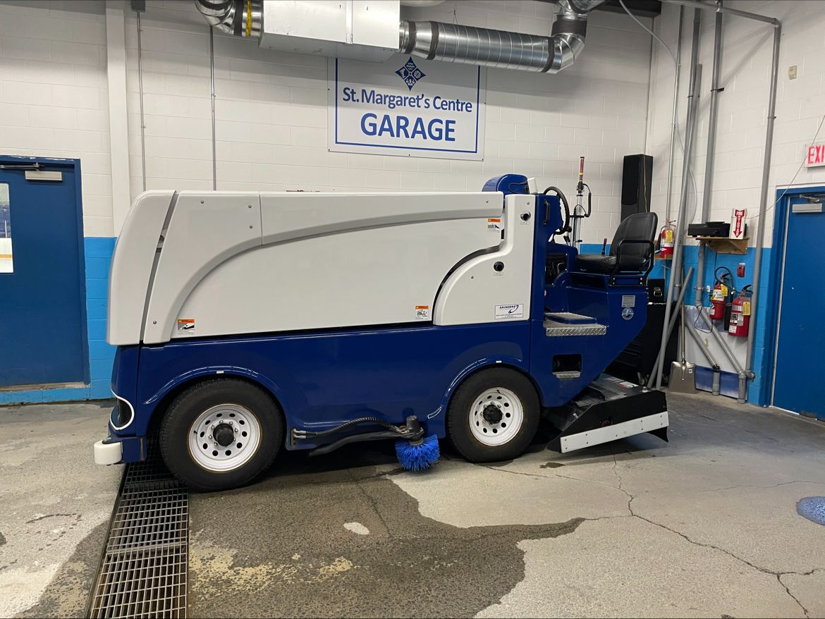 Electric ice resurfacing machine in the garage at St. Margaret’s Centre.
