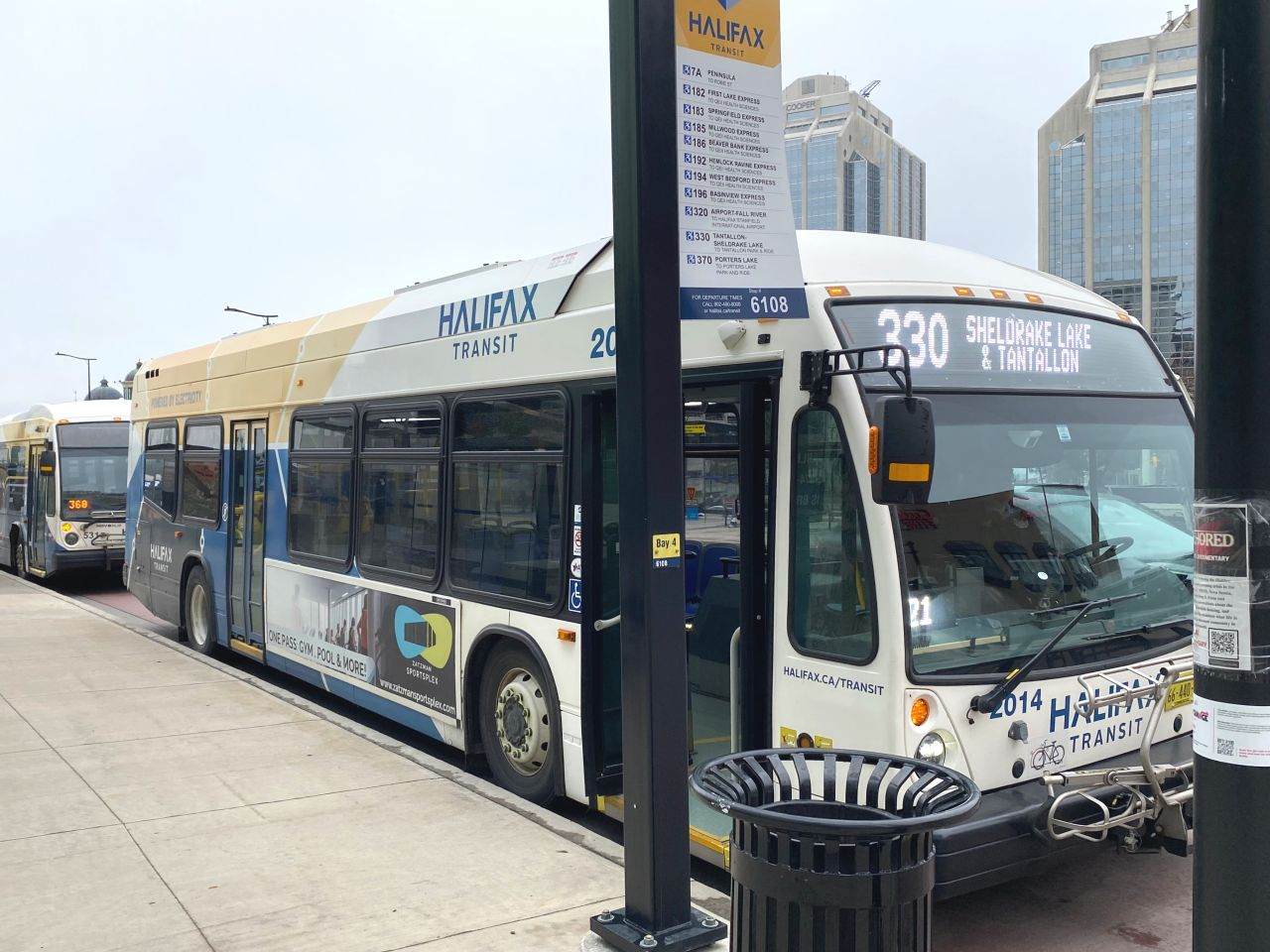 Halifax Transit bus at a downtown bus stop.