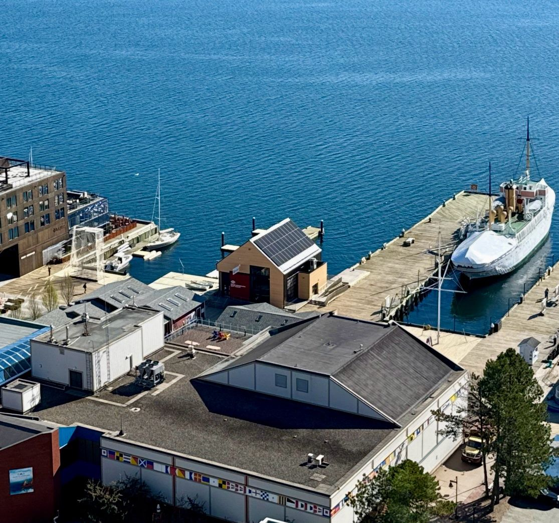 Aerial view of the Boat School beside the Maritime Museum of the Atlantic, with rooftop solar panels.